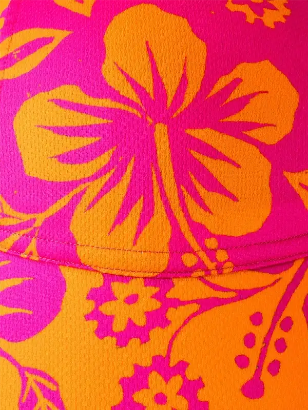 Vibrant pink and orange floral print cycling jersey fabric close-up