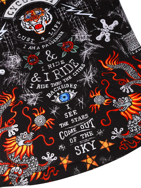 Black fabric with colorful graphics and text, including dragons and eye designs.