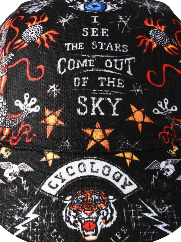Black cycling cap with 'I SEE THE STARS COME OUT OF THE SKY' text, tiger, stars, and skulls design