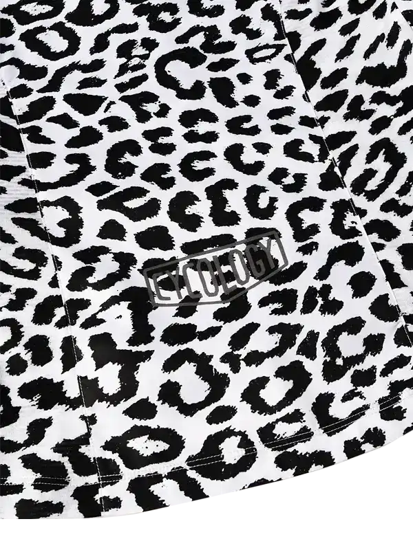 Black and white leopard print cycling jersey with bold graphic design and brand logo detail