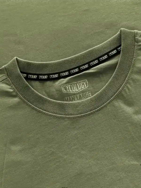 Olive green men's cycling t-shirt with branded neck tape and size label, made from high-quality fabric