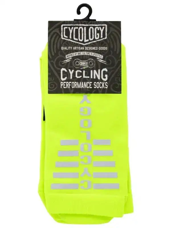 Neon yellow cycling performance socks with reflective 'CYCOLOGY' branding, ideal for bike culture and safety.