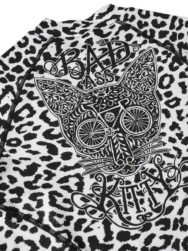 Leopard print cycling jersey with 'Bad Ass Kitty' cat graphic and bike design