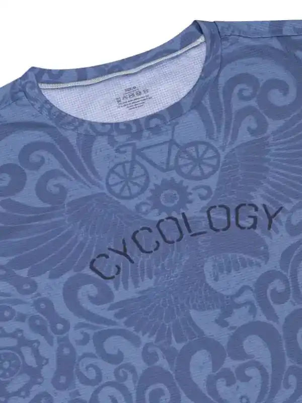 Blue cycling jersey with 'CYCOLOGY' text and bike gear pattern, featuring unique design for men and women.