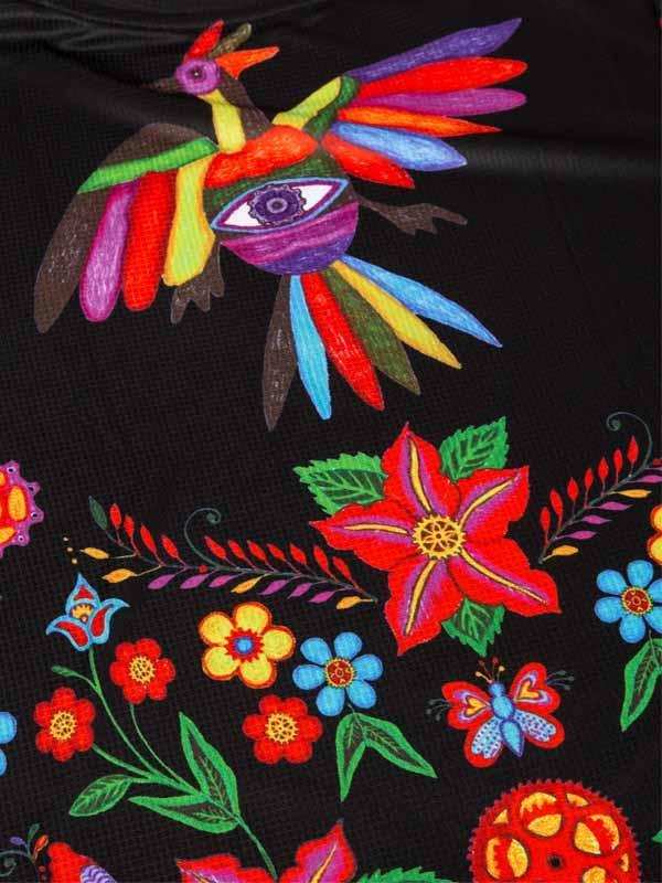 Colorful bird and floral print on black cycling jersey fabric