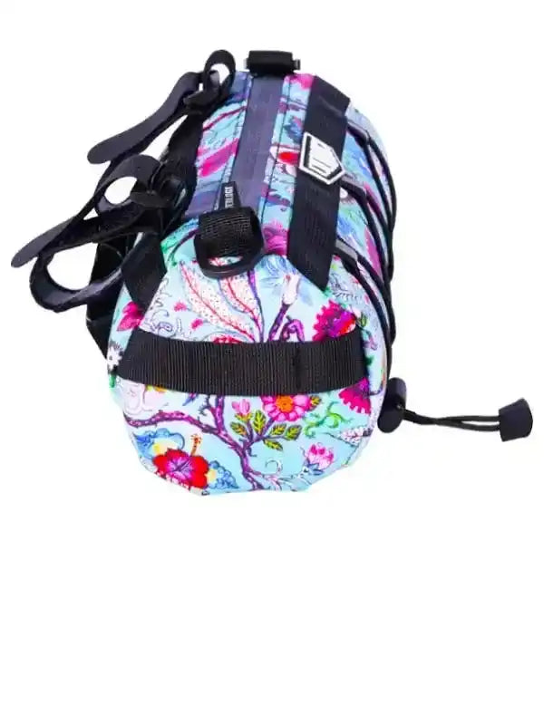 Colorful floral cycling seat bag with black straps and drawstring closure