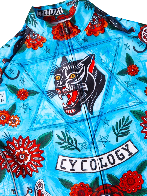 Colorful  jersey with a panther design and 'Cycology' branding on a blue background