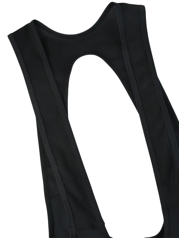 Close-up of the back of a black bib-style cycling  bibs showing wide shoulder straps and a large cutout opening on a plain white background.