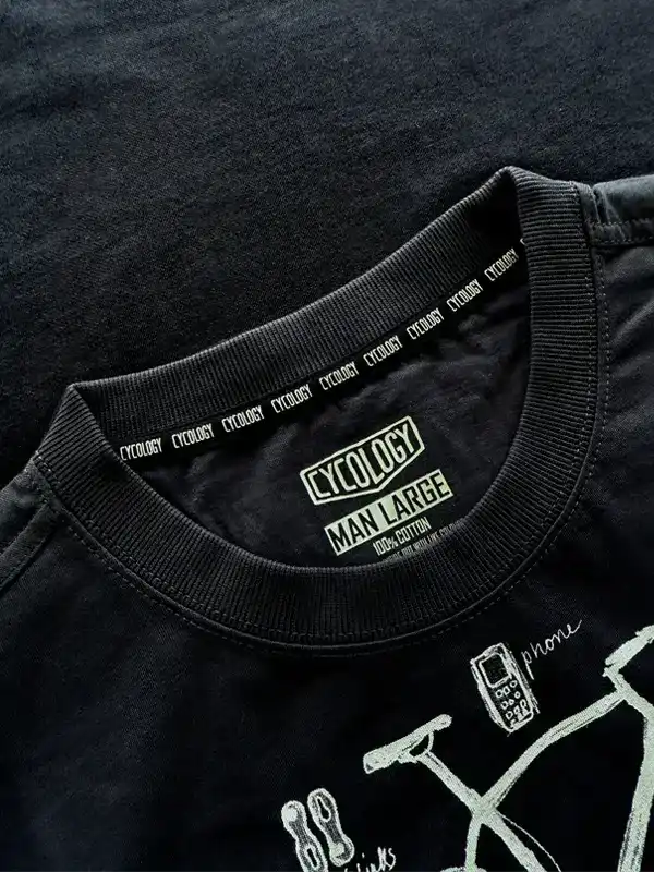 Black men's cycling t-shirt with graphic bike print, 100% cotton, size large, brand tag detail