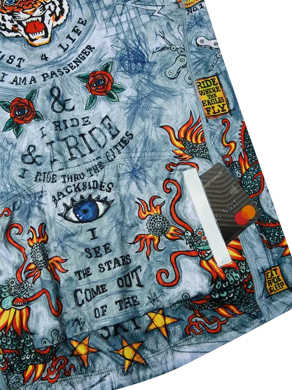 Cycling Jersey with tattoo-style graphics and text on a grey background