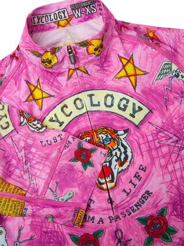 Pink women's cycling jersey with tiger, roses, stars, and bold graphics for performance rides