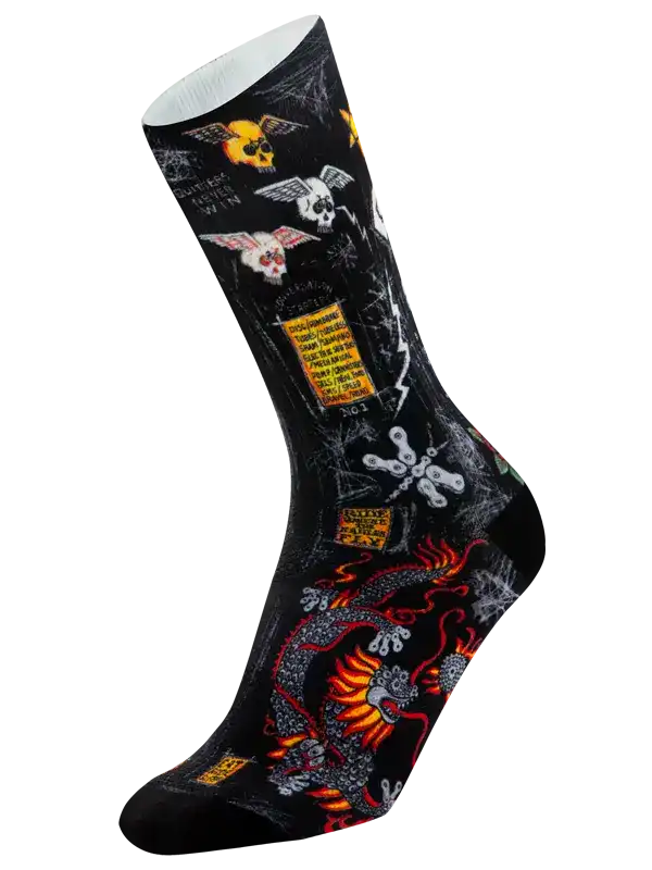 Black cycling sock with skull, dragon, and bike chain graphics for men and women