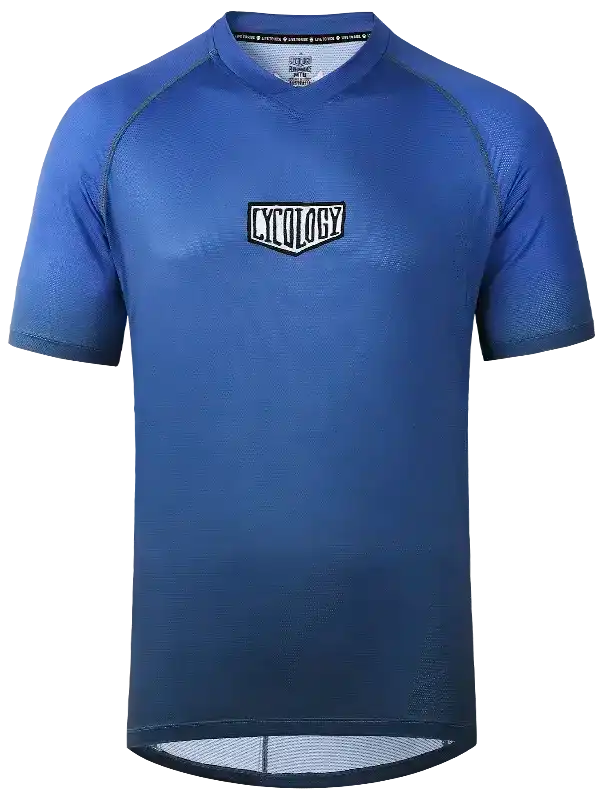 Blue men's cycling jersey with breathable fabric and logo, ideal for road biking and performance rides.