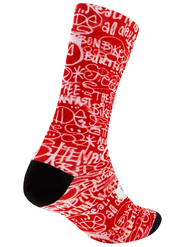 Red cycling sock with white graffiti-style text and black toe, designed for bike rides and athletic performance.