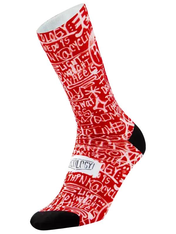 Red cycling socks with white graffiti-style text design, black toe and heel, for men's and women's bike rides