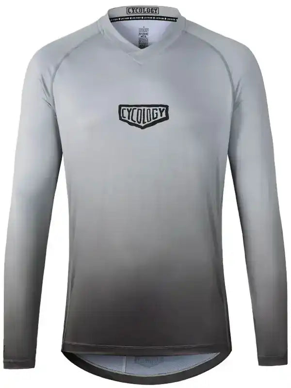 Men's long sleeve cycling jersey with gradient gray design and Cycology logo, ideal for road biking