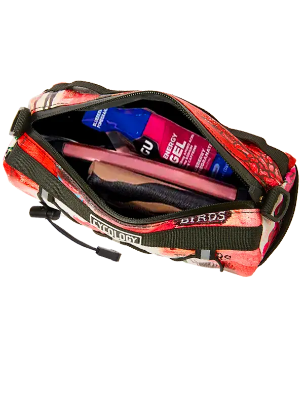 Floral-patterned bike bag with visible contents on a white background