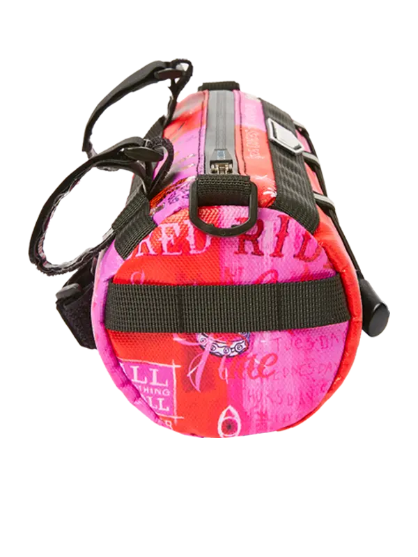 Floral-patterned bike handlebar bag with 'Cycology' branding