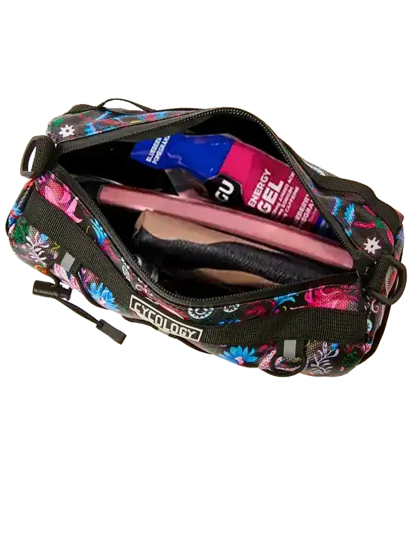 Cycology floral cycling waist bag with energy gels and phone inside, perfect for rides