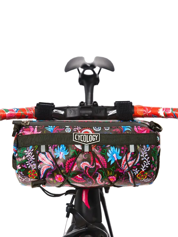 Floral-patterned bike handlebar bag with 'Cycology' branding