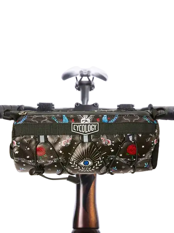 Cycology bike frame bag with mystical eye and rose print, mounted on handlebars for cycling gear storage