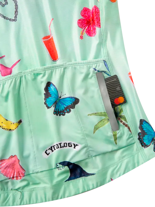 Light green cycling jersey with colorful tropical patterns 
