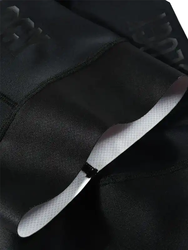 Black cycling shorts with padded chamois and ergonomic seams for comfort and performance