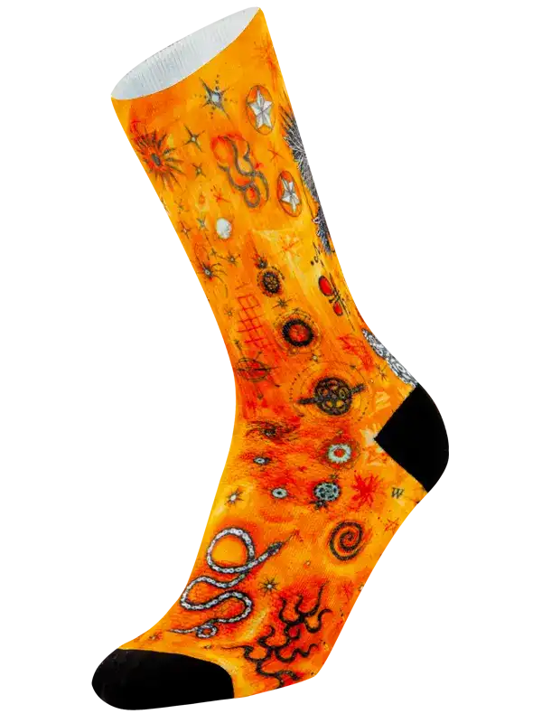 Vibrant orange cycling sock with cosmic star and planet print, black toe and heel, unique design for cyclists