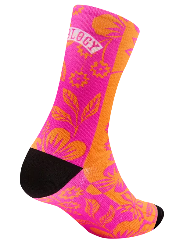 Colorful sock with pink and orange patterns on a white background