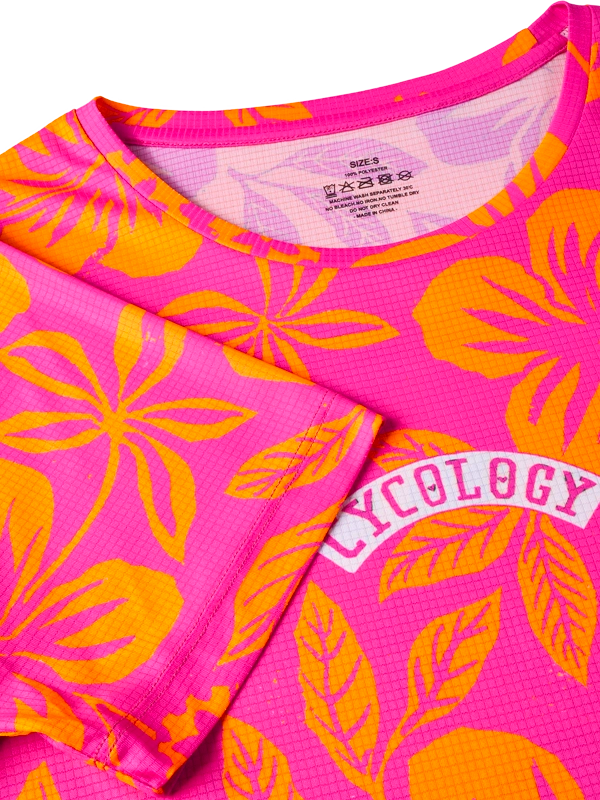 Pink and orange floral patterned  tech tee shirt with 'Cycology' branding