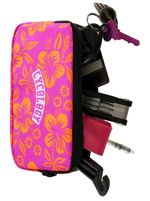 Pink and orange floral Oahu Cycling Wallet by Cycology Clothing with keys attached