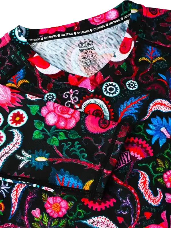 Vibrant floral and gear patterned cycling jersey with 'Live to Ride' collar tag, performance MTB fabric