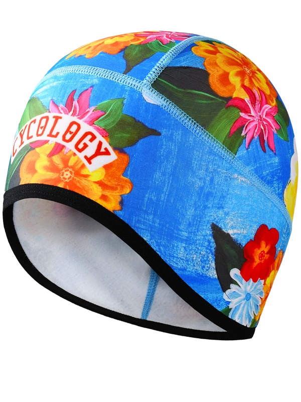 Colorful cycling beanie with floral design and 'Cycology' branding on a blue background