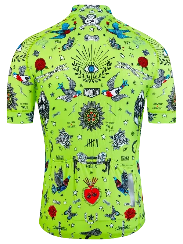 Vibrant green men's cycling jersey with tattoo-style birds, roses, and eye design, ideal for road biking.