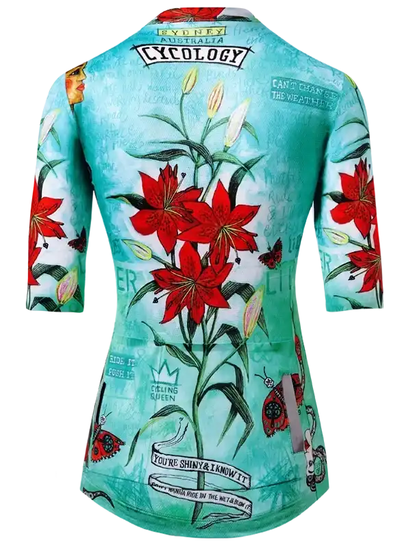 Women's cycling jersey with red lily print, floral design, and motivational quotes for road biking