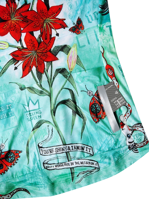 Aqua women's cycling jersey with red floral design back pockets