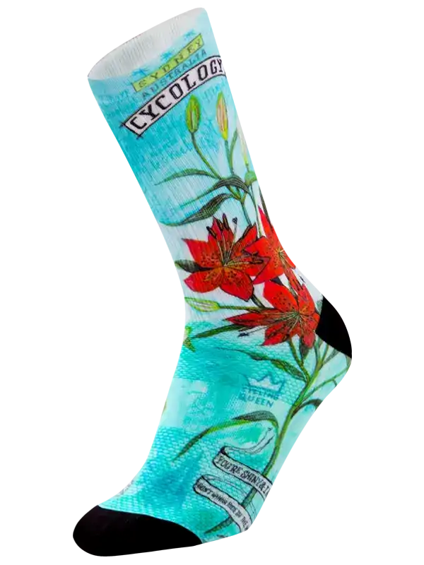 Cycling socks with red lily print, turquoise background, and 'Cycology' branding for men's and women's bike wear