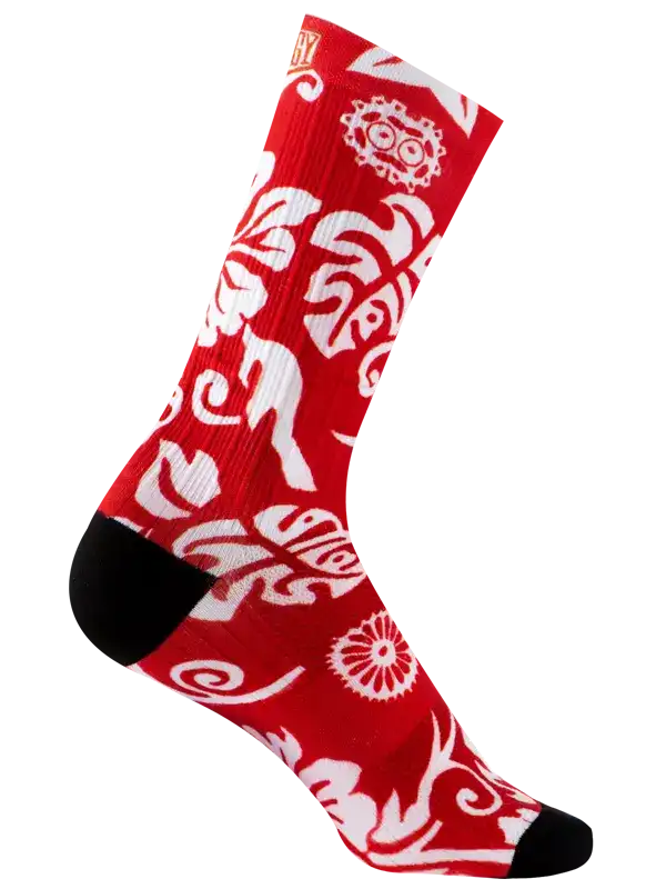 Red cycling socks with white tropical leaf and gear pattern, black toe and heel
