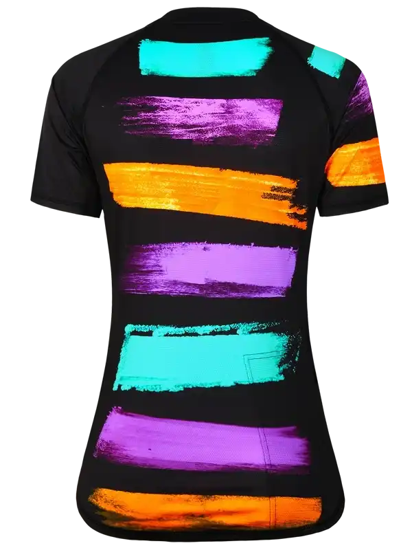 Women's cycling jersey with bold neon brushstroke stripes in purple, orange, and teal on black.
