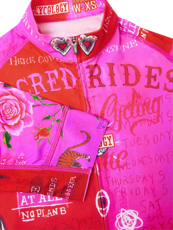 Pink and red cycling jersey with text and graphics on a white background