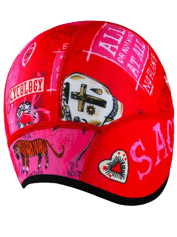 Red cycling cap with bold graffiti-style graphics, tiger, heart, and skull designs for men's and women's bike wear