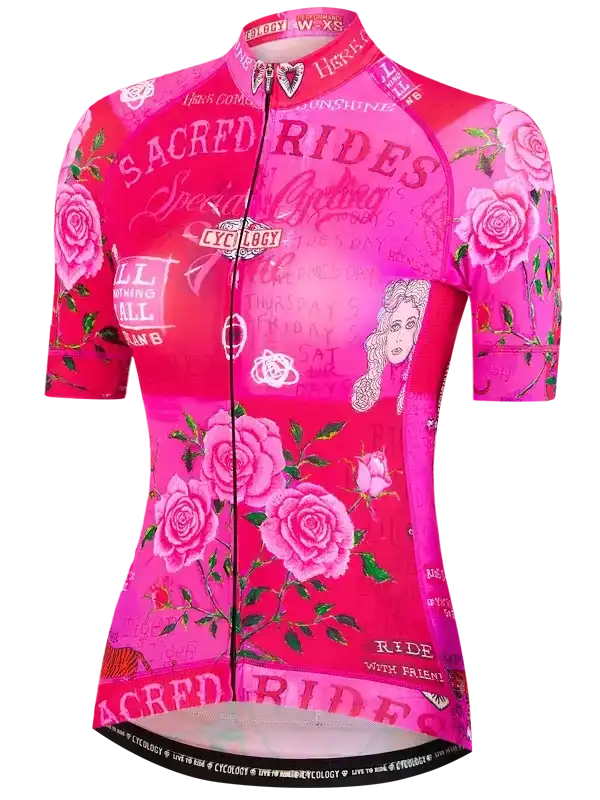 Women's pink cycling jersey with rose print and 'Sacred Rides' design, short sleeve bike top