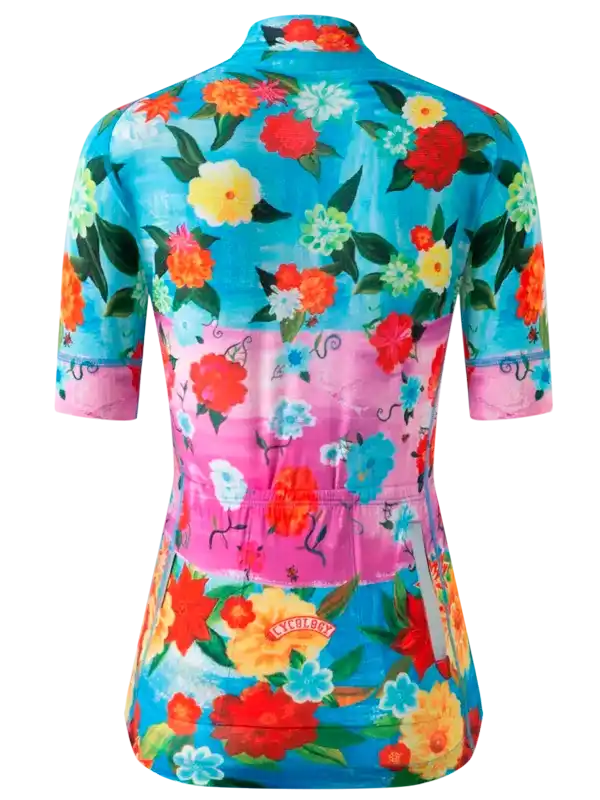 Women's floral cycling jersey with vibrant flowers, pink accents, and back pockets for rides