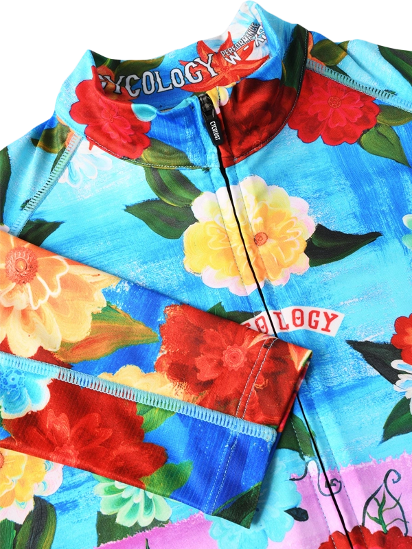 Colorful cycling jersey with floral design and 'Cyology' branding
