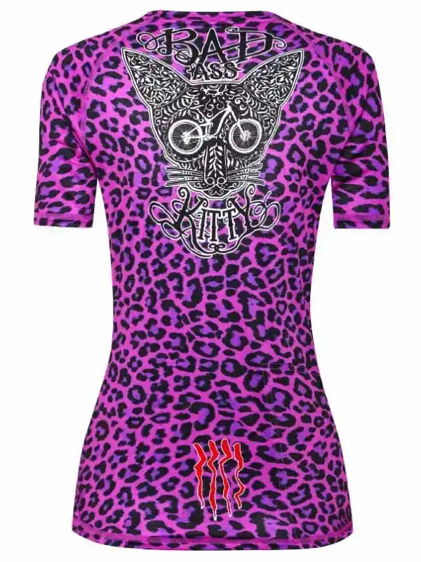 Women's purple leopard print cycling jersey with 'Bad Ass Kitty' graphic and red claw marks