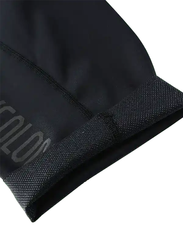 Black cycling cap with mesh panel and subtle logo detail for breathable comfort