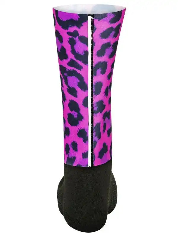 Pink and purple leopard print cycling leg warmer with black base and white zipper detail