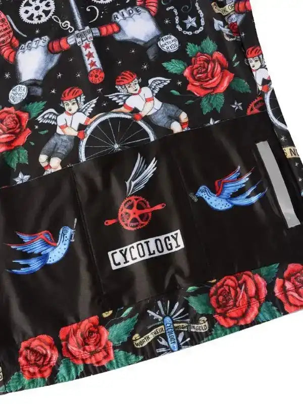Cycology cycling jersey with tattoo-style roses, angels, and birds on black fabric