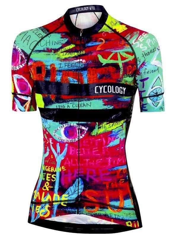 Women's colorful graphic cycling jersey with bold text and art, featuring full zip and fitted design