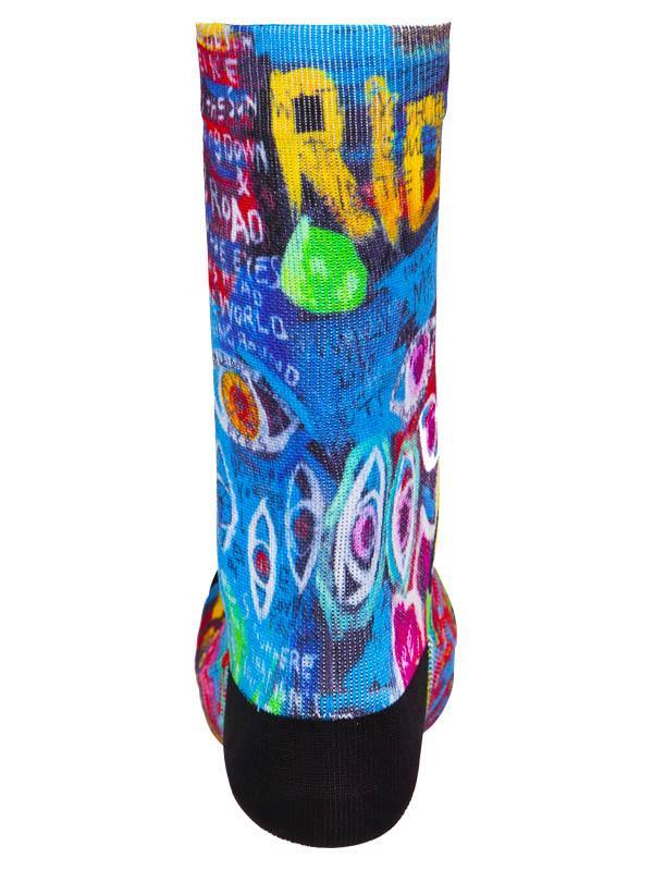 Colorful cycling sock with bold graffiti-style 'RIDE' print, vibrant patterns, and black toe/heel for men's or women's bike rides.